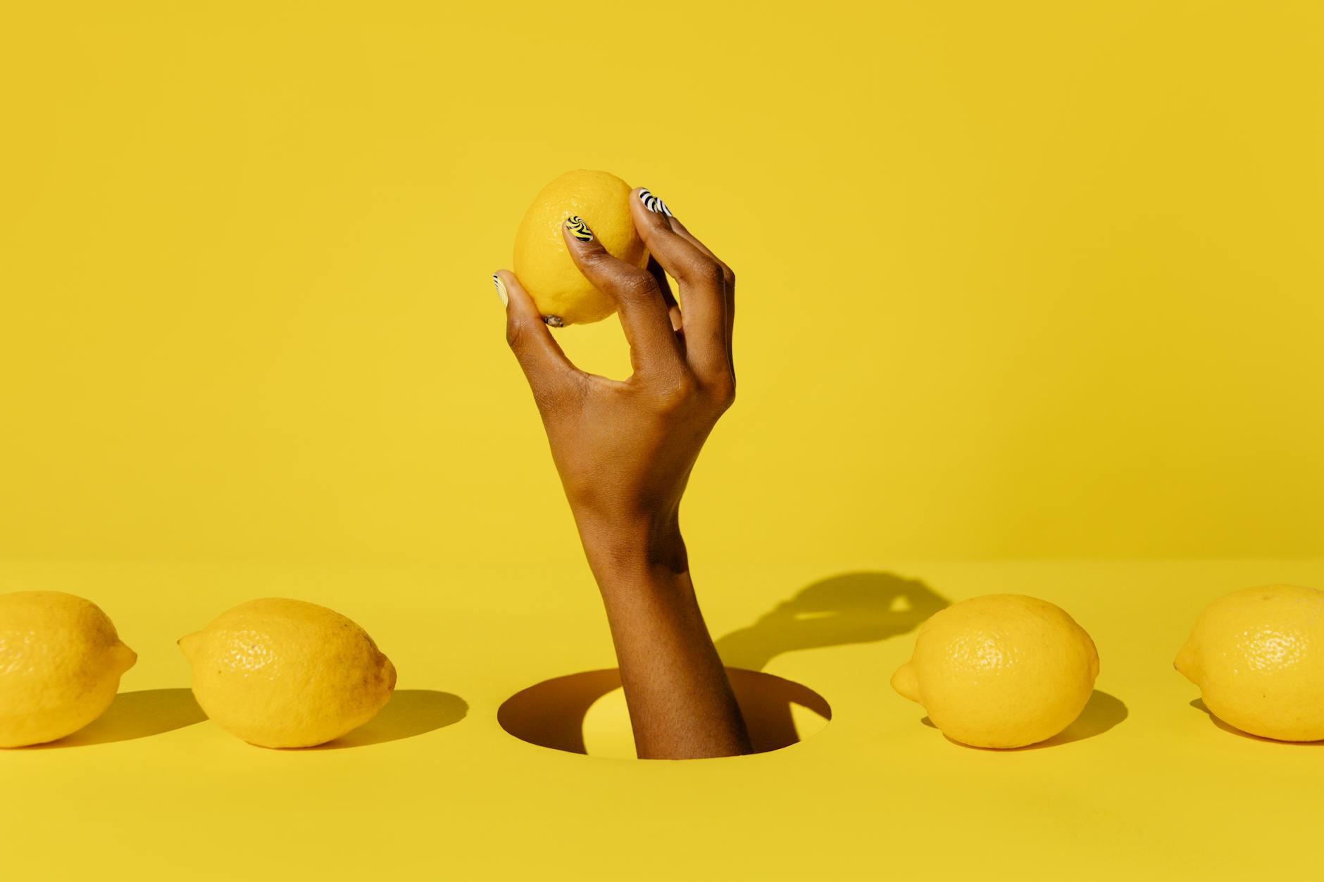 A yellow silicone vibrator surrounded by peeled bananas on a bright yellow background, symbolizing pleasure and sensuality.
